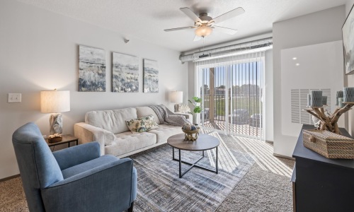 a living room with a couch and a chair